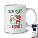 Personalized Custom Name Stay Cozy And Bright; Amazing Christmas Moon Santa Snowman T-Shirt