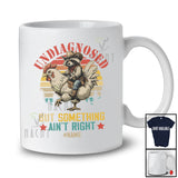 Personalized Custom Name Undiagnosed Something Ain't Right; Joyful Raccoon On Chicken; Vintage Retro T-Shirt