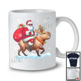 Santa Riding Capybara Reindeer; Awesome Christmas Capybara Snowing Around; Rodent Animal T-Shirt