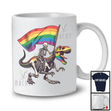 Skeleton Riding T-Rex, Humorous LGBTQ Pride Skeleton With Gay Rainbow Flag, Dinosaur Lover T-Shirt