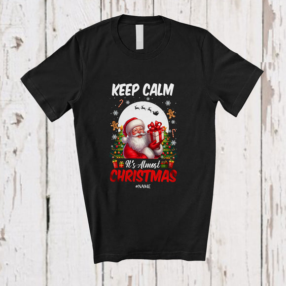 MacnyStore - Personalized Custom Name Keep Calm It's Almost Christmas; Cheerful X-mas Tree Moon Santa; Family T-Shirt