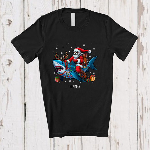 MacnyStore - Personalized Custom Name Santa Riding Reindeer Shark; Amusing Christmas Lights Sea Animal T-Shirt
