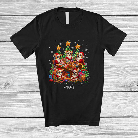 MacnyStore - Personalized Custom Name Workshop With Santa Corgi Working; Joyful Christmas Family T-Shirt