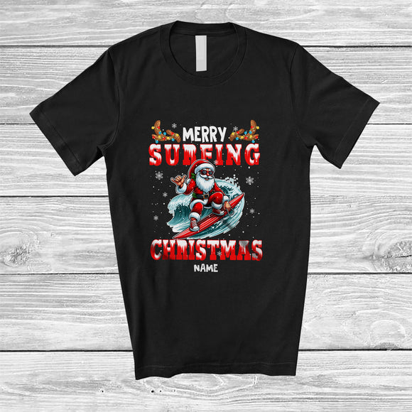 MacnyStore - Personalized Custom Name Merry Surfing Christmas; Joyful Santa Surfing Snow Around; Family T-Shirt