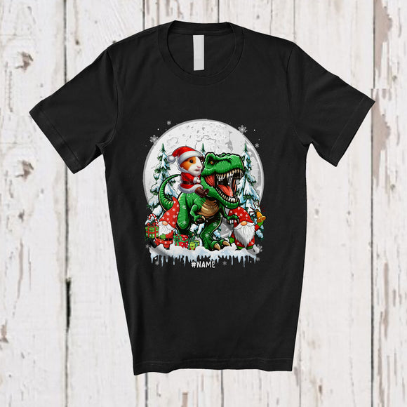 MacnyStore - Personalized Custom Name Santa Guinea Pig Riding T-Rex; Joyful Christmas Moon Pajama Family T-Shirt