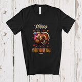 MacnyStore - Personalized Custom Name Happy Catsgiving; Humorous Thanksgiving Pilgrim Cat Riding Turkey T-Shirt
