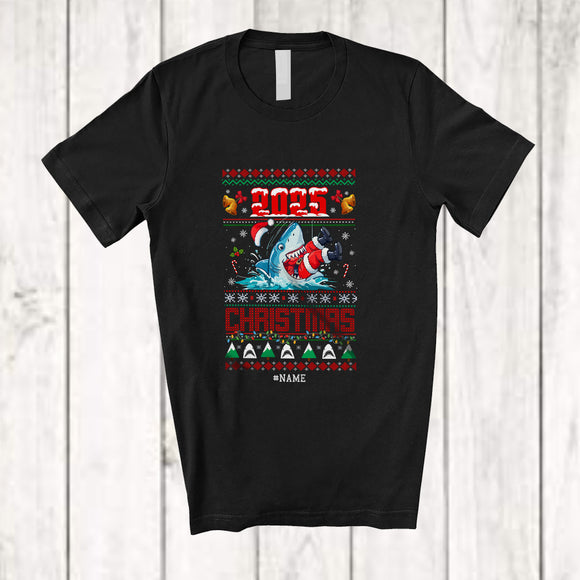 MacnyStore - Personalized Custom Name 2025 Christmas; Awesome X-mas Sweater Shark Eating Santa; Sea Animal T-Shirt
