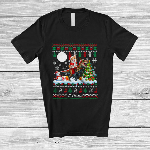 MacnyStore - Personalized Custom Name Santa Corgi Riding T-Rex; Merry Christmas Sweater Moon Animal T-Shirt