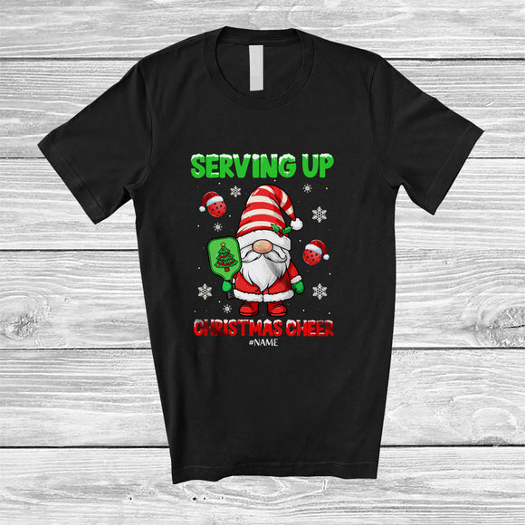 MacnyStore - Personalized Serving Up Christmas Cheer; Joyful Custom Name Gnome Playing Pickleballs Player T-Shirt