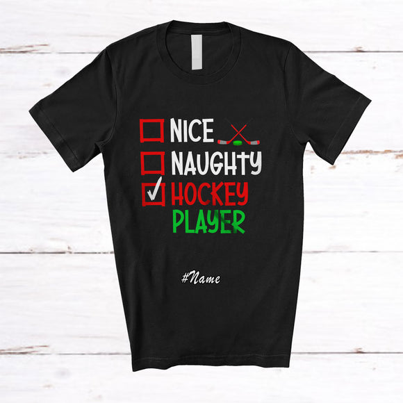 MacnyStore - Personalized Custom Name Nice Naughty Hockey Player; Humorous Christmas Playing Sport T-Shirt