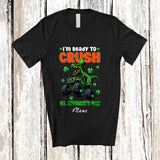 MacnyStore - Personalized Custom Name Crush St. Patrick's Day; Joyful T-Rex Riding Monster Truck Shamrock T-Shirt