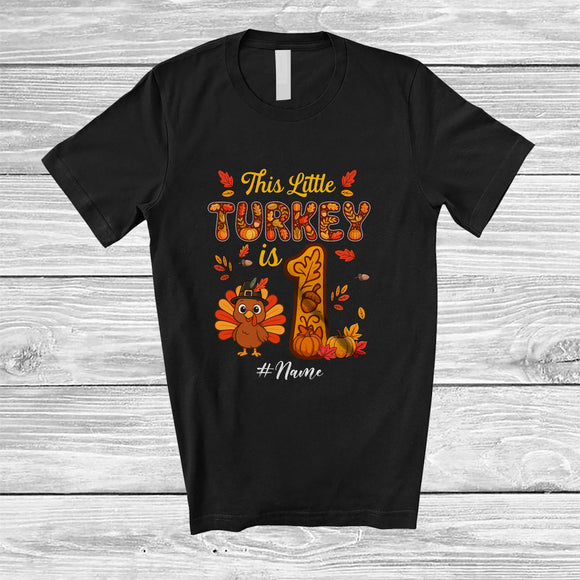 MacnyStore - Personalized Custom Name This Little Turkey Is 1; Joyful 1st Birthday Thanksgiving Fall Family T-Shirt