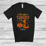 MacnyStore - Personalized Custom Name This Little Turkey Is 1; Joyful 1st Birthday Thanksgiving Fall Family T-Shirt