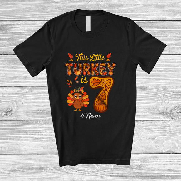 MacnyStore - Personalized Custom Name This Little Turkey Is 7; Joyful 7th Birthday Thanksgiving Fall Family T-Shirt