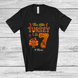 MacnyStore - Personalized Custom Name This Little Turkey Is 7; Joyful 7th Birthday Thanksgiving Fall Family T-Shirt