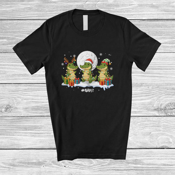 MacnyStore - Personalized Custom Name Three Santa Elf Crocodilia; Amusing Christmas Moon Snowing Animal T-Shirt