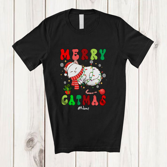 MacnyStore - Personalized Custom Name Merry Catmas; Adorable Christmas Lights Sleeping Santa Cat Lover T-Shirt