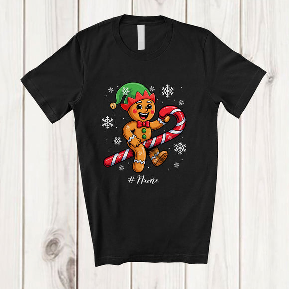 MacnyStore - Personalized Custom Name Elf Gingerbread Riding Candy Canes; Joyful Christmas Baking Baker T-Shirt