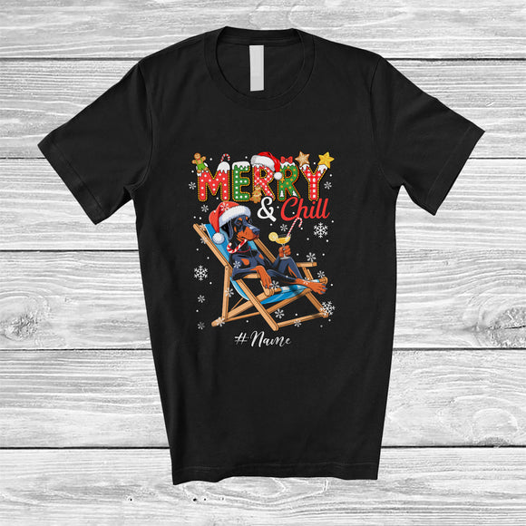 MacnyStore - Personalized Custom Name Merry And Chill; Lovely Christmas Holiday Vacation Santa Dobermanns T-Shirt