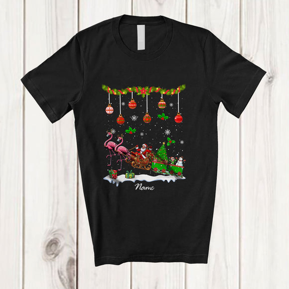MacnyStore - Personalized Custom Name Santa Sleigh Flamingo With Christmas Tree; Joyful Pajama Family T-Shirt