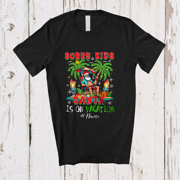 MacnyStore - Personalized Custom Name Sorry Kids Santa Is On Vacation; Awesome Christmas Hawaii Beach T-Shirt