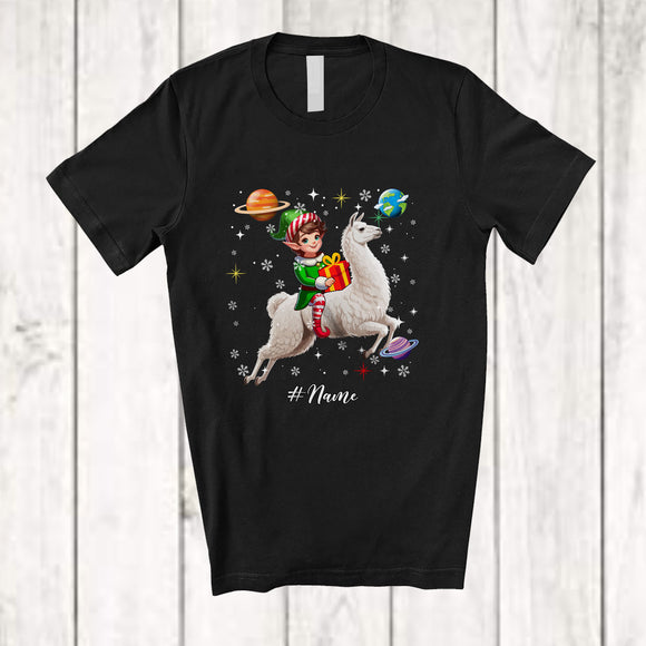 MacnyStore - Personalized Custom Name Elf Riding Llama; Awesome Christmas Elf In Space Galaxy T-Shirt