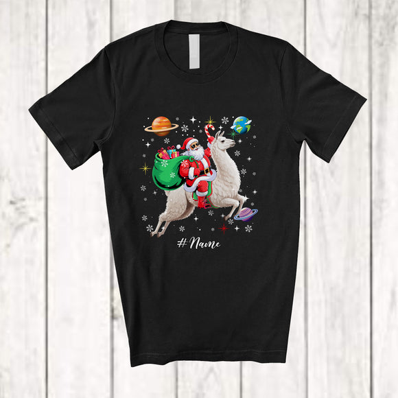 MacnyStore - Personalized Custom Name Santa Riding Llama; Awesome Christmas Santa In Space Galaxy T-Shirt