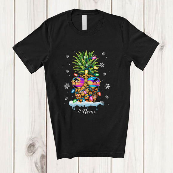MacnyStore - Personalized Custom Name Santa Pineapple Sunglasses; Joyful Christmas Lights Family Group T-Shirt