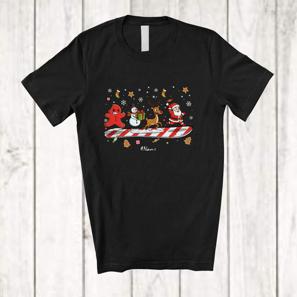 MacnyStore - Personalized Custom Name Candy Canes Sleigh Santa Gingerbread Reindeer Snowman; Joyful Christmas Family T-Shirt