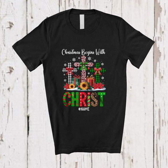 MacnyStore - Personalized Custom Name Christmas Begins With Christ; Awesome X-mas Three Leopard Plaid Cross T-Shirt