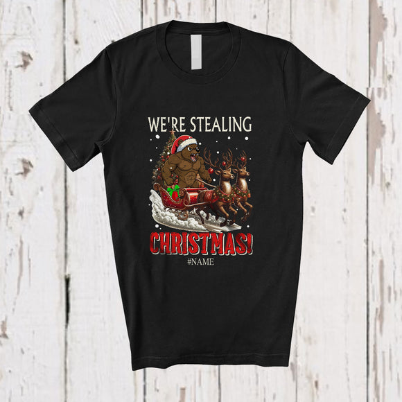 MacnyStore - Personalized Custom Name We're Stealing Christmas; Amusing Santa Bear Feral Sleigh Reindeer T-Shirt