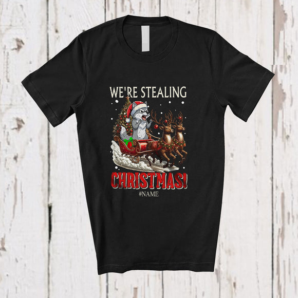 MacnyStore - Personalized Custom Name We're Stealing Christmas; Amusing Santa Wolf Feral Sleigh Reindeer T-Shirt