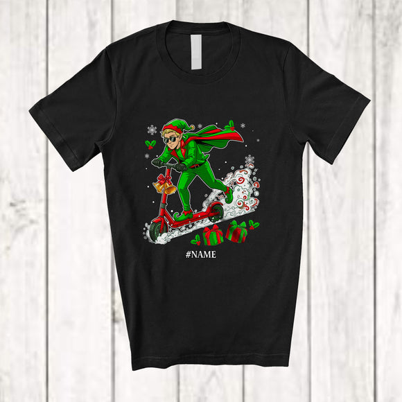 MacnyStore - Personalized Custom Name Elf Riding Scooter; Amusing Christmas Elf Snow; Pajama Family T-Shirt