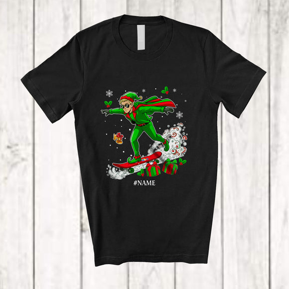 MacnyStore - Personalized Custom Name Elf Riding Skateboard; Amusing Christmas Elf Snow; Pajama Family T-Shirt