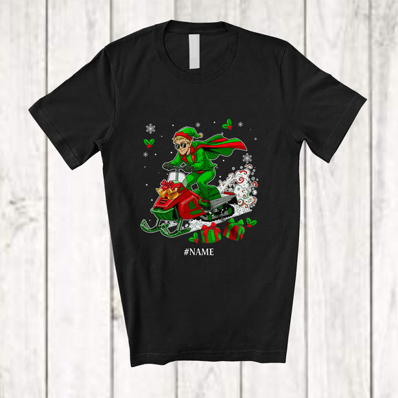MacnyStore - Personalized Custom Name Elf Riding Snowmobile; Amusing Christmas Elf Snow; Pajama Family T-Shirt