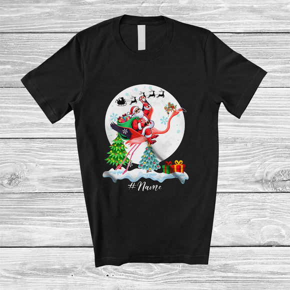MacnyStore - Personalized Custom Name Santa Riding Flamingo; Lovely Christmas Moon Wild Animal; Family T-Shirt