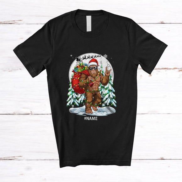 MacnyStore - Personalized Custom Name Santa Bigfoot Rock; Joyful Christmas Moon Bigfoot Sunglasses; Family T-Shirt