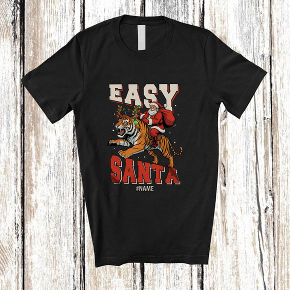 MacnyStore - Personalized Custom Name Easy Santa; Amusing Christmas Santa Riding Tiger Reindeer T-Shirt