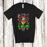 MacnyStore - Personalized Custom Name I'm On Santa's Awesome List; Amazing Christmas Santa Elf Face T-Shirt