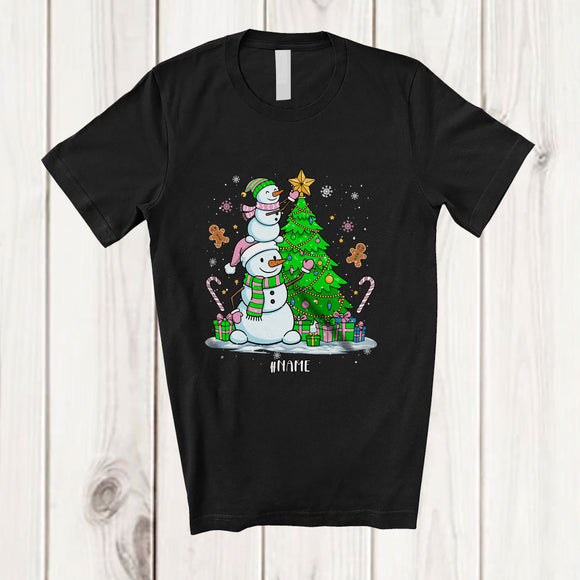 MacnyStore - Personalized Custom Name Snowman Building X-mas Tree; Adorable Christmas Snow Family T-Shirt