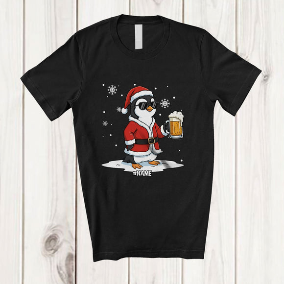 MacnyStore - Personalized Custom Name Penguin Santa Sunglasses Drinking Beer; Joyful Christmas Drunker T-Shirt