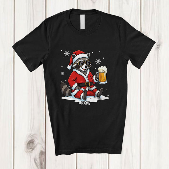 MacnyStore - Personalized Custom Name Raccoon Santa Sunglasses Drinking Beer; Joyful Christmas Drunker T-Shirt