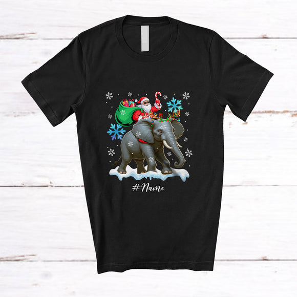 MacnyStore - Personalized Custom Name Santa Riding Elephant Reindeer; Lovely Christmas Elephant Snow Around Animal Lover T-Shirt