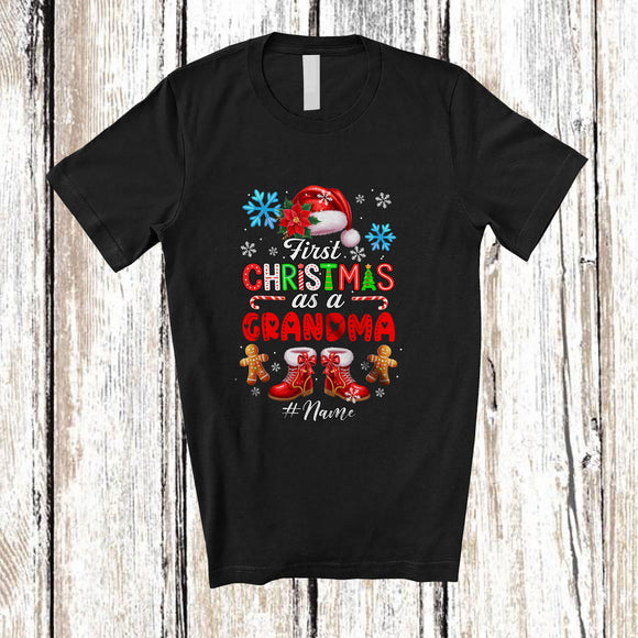 MacnyStore - Personalized Custom Name First Christmas As A Grandma; Joyful Santa Promoting Future; Family T-Shirt