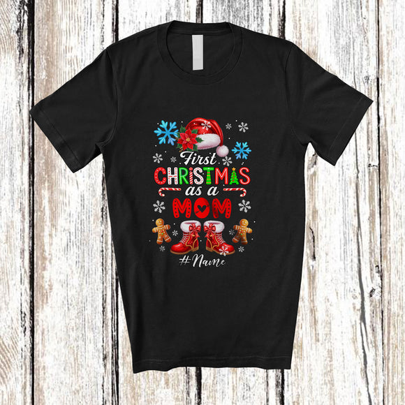 MacnyStore - Personalized Custom Name First Christmas As A Mom; Joyful Santa Promoting Future; Family T-Shirt
