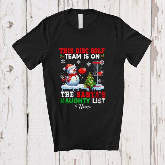 MacnyStore - Personalized Custom Name Disc Golf Team On Santa's Naughty List; Joyful Christmas Snowman Player T-Shirt