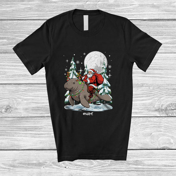 MacnyStore - Personalized Custom Name Santa Riding Manatee; Amusing Christmas Tree Moon Santa Sea Animal T-Shirt