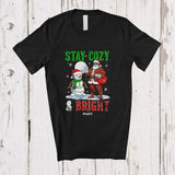MacnyStore - Personalized Custom Name Stay Cozy And Bright; Amazing Christmas Moon Santa Snowman T-Shirt