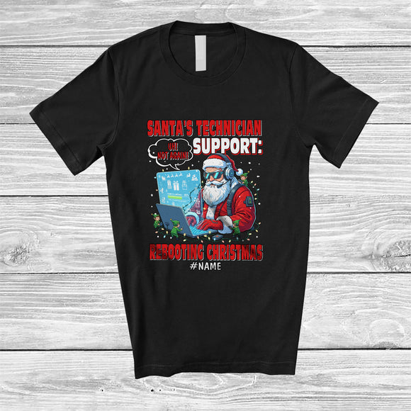 MacnyStore - Personalized Custom Name Santa's Technician Support Rebooting Christmas; Proud IT Group T-Shirt