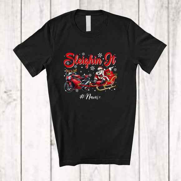 MacnyStore - Personalized Custom Name Sleighin It; Joyful Christmas Santa Dabbing Sleigh Motorbike Reindeer T-Shirt